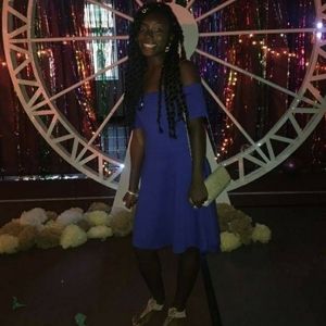 Off the shoulder royal blue dress.